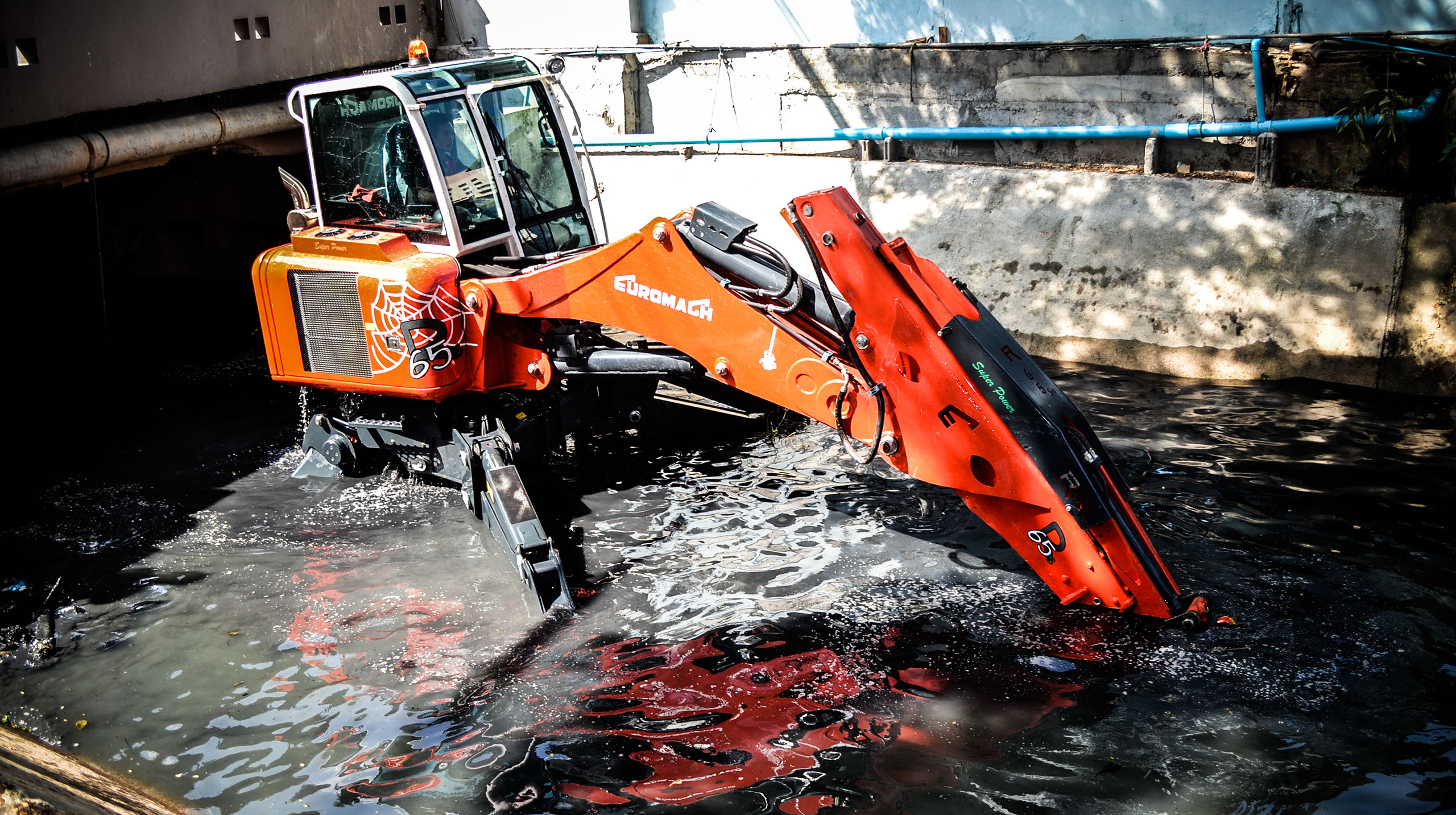Euromach R65 SL cleaning a canal in Chiang Mai, Thailand.